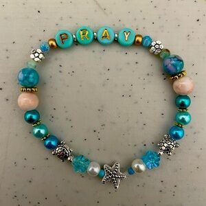 Pray bracelet in beach colors